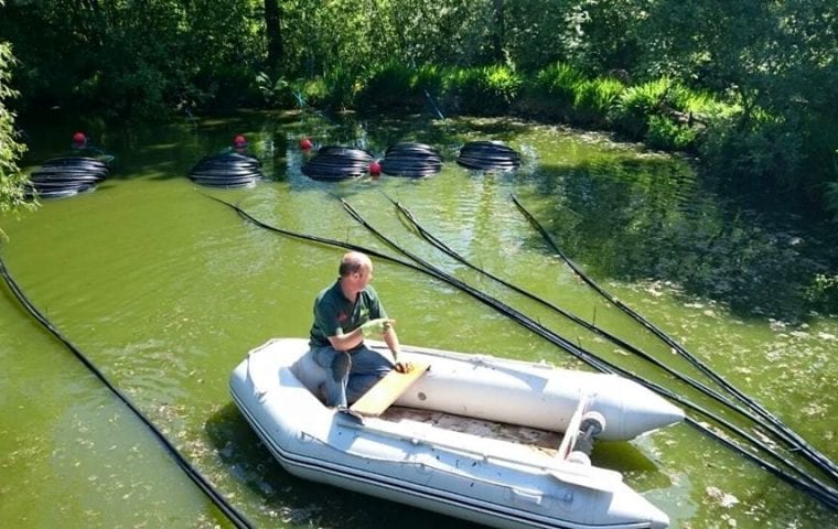 Ground source review blue ball lodge water source heat pump - Pond Mat Installation