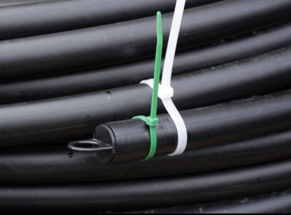 Ground source heat pump coiled slinky pipe - green
