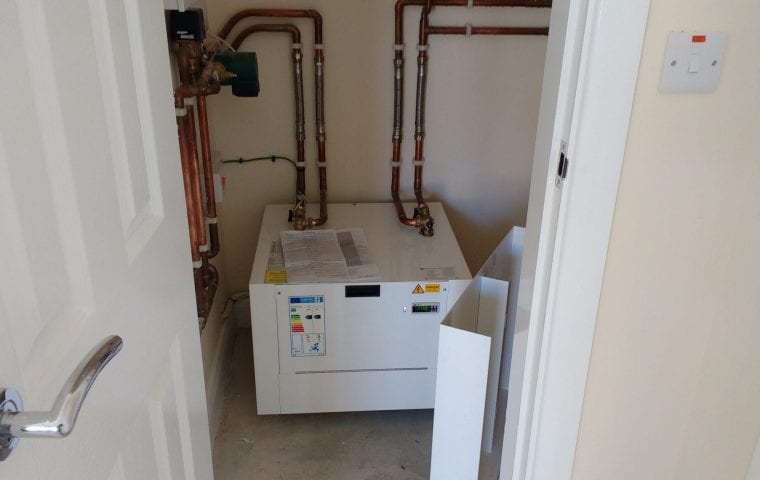 Ground Source Review: Shropshire Rural Housing, Llanymynech: Shoebox heat pump in cupboard