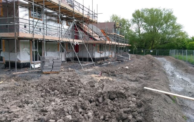 Tuckers Close ground source heat pump case study: insulation and scaffolding