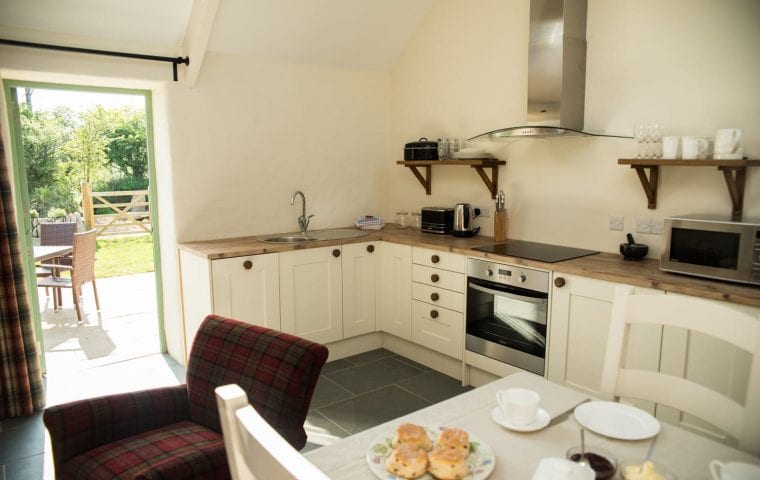 Blaenllechog Farm water source heat pump case study: finished kitchen in the milking parlour