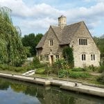 A house by the water with a water source heat pump