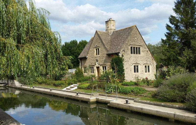 A house by the water with a water source heat pump