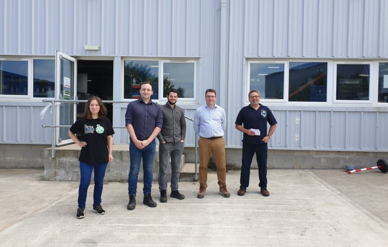 The Kensa Team Outside the Factory